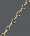 Wrap your wrists in links of love. This intricate bracelet by Victoria Townsend features open-cut hearts connected with sparkling diamond accents. Crafted in 18k gold over sterling silver. Approximate length: 7 inches.
