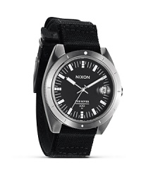 Solid with a surplus inspired design, this watch from Nixon flaunts a commanding look with performance-upping features like three-hand movement, durable canvas strap, and superfine markers. Solid with a surplus inspired design, this watch from Nixon flaunts a commanding look with performance-upping features like three-hand movement, durable canvas strap, and superfine markers.