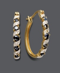 A simple twist makes a stylish impact. Victoria Townsend's hoop earrings highlight round-cut sapphires (3/4 ct. t.w.) accented by sparkling diamonds. Crafted in 18k gold over sterling silver. Approximate diameter: 1 inch. A simple twist makes a stylish impact. Victoria Townsend's hoop earrings highlight round-cut sapphires (3/4 ct. t.w.) accented by sparkling diamonds. Crafted in 18k gold over sterling silver. Approximate diameter: 1 inch.
