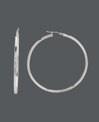 Celebrities and fashionistas alike can all embrace the hoop trend. For all-enduring style, snap up these statement-making large hoops crafted in a polished 14k white gold setting. Approximate diameter: 2-1/4 inches. Celebrities and fashionistas alike can all embrace the hoop trend. For all-enduring style, snap up these statement-making large hoops crafted in a polished 14k white gold setting. Approximate diameter: 2-1/4 inches.