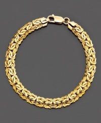 Exquisitely molded 14k gold on this bracelet recalls the richness of the Byzantine period. Measures 8 inches long. Exquisitely molded 14k gold on this bracelet recalls the richness of the Byzantine period. Measures 8 inches long.