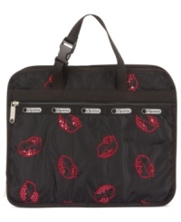 Before you jump on that jet, be sure to pack this travel-ready toiletry bag from LeSportsac. Spacious, sequin splashed with pockets aplenty, it stashes all your on-the-go essentials without a worry. Before you jump on that jet, be sure to pack this travel-ready toiletry bag from LeSportsac. Spacious, sequin splashed with pockets aplenty, it stashes all your on-the-go essentials without a worry.