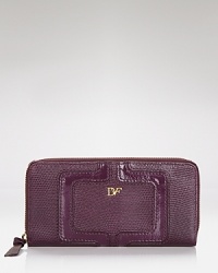 This DIANE von FURSTENBERG wallet flaunts a perfect mix of style and substance, crafted of print-splashed leather. It's an instant status update. This DIANE von FURSTENBERG wallet flaunts a perfect mix of style and substance, crafted of print-splashed leather. It's an instant status update.