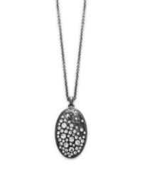 This style will have you seeing stars. Eliot Danori's petite Star Struck pendant adds a look of instant glamour. Crafted in anthracite tone mixed metal with sparkling crystal accents. Approximate length: 16 inches + 2-inch extender. Approximate drop: 1 inch. This style will have you seeing stars. Eliot Danori's petite Star Struck pendant adds a look of instant glamour. Crafted in anthracite tone mixed metal with sparkling crystal accents. Approximate length: 16 inches + 2-inch extender. Approximate drop: 1 inch.