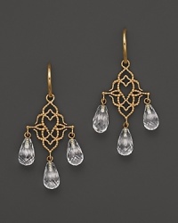 Rose gold chandelier earrings with quartz crystals from Lisa Nik. Rose gold chandelier earrings with quartz crystals from Lisa Nik.