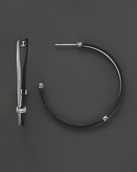 Detailed with diamonds and 18K white gold, Charriol's Modern Cable Mix hoop earrings lend a bold look. Detailed with diamonds and 18K white gold, Charriol's Modern Cable Mix hoop earrings lend a bold look.