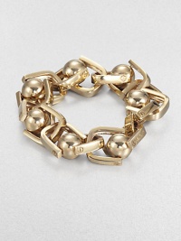 A visual pun on a vintage phrase, bold links and smooth beads alternate in this striking design.BrassLength, about 7.5Width, about .75Fold-over claspImported A visual pun on a vintage phrase, bold links and smooth beads alternate in this striking design.BrassLength, about 7.5Width, about .75Fold-over claspImported