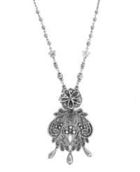 Frilly, fancy, and totally fashionable. Jessica Simpson's delicate drop pendant combines a lovely lace design accented by shimmering simulated pearl drops. Crafted in silver tone mixed metal. Approximate length: 30 inches. Approximate drop: 3-1/2 inches. Frilly, fancy, and totally fashionable. Jessica Simpson's delicate drop pendant combines a lovely lace design accented by shimmering simulated pearl drops. Crafted in silver tone mixed metal. Approximate length: 30 inches. Approximate drop: 3-1/2 inches.