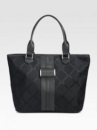 This two-tone leather accented signature jacquard design is the perfect roomy carryall for all your daily essentials.Double leather shoulder straps, 8 dropTop zip closureProtective metal feetOne inside zip pocketFive inside open pocketsFully lined12½W X 11H X 5DImported This two-tone leather accented signature jacquard design is the perfect roomy carryall for all your daily essentials.Double leather shoulder straps, 8 dropTop zip closureProtective metal feetOne inside zip pocketFive inside open pocketsFully lined12½W X 11H X 5DImported
