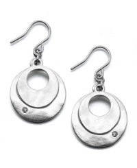 Two silvertone disks glimmer like the moon on these modern Kenneth Cole New York earrings. Crafted in silvertone mixed metal and crystal accents. Approximate drop: 1 inch. Two silvertone disks glimmer like the moon on these modern Kenneth Cole New York earrings. Crafted in silvertone mixed metal and crystal accents. Approximate drop: 1 inch.