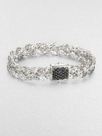 An intricately braided, sterling silver design accented with a rich, black sapphire encrusted closure. Sterling silverBlack sapphireLength, about 7.25Push clasp closureImported An intricately braided, sterling silver design accented with a rich, black sapphire encrusted closure. Sterling silverBlack sapphireLength, about 7.25Push clasp closureImported