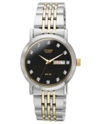 Swarovski elements swim and shimmer on a blacked out dial on this sophisticated Citizen watch. Swarovski elements swim and shimmer on a blacked out dial on this sophisticated Citizen watch.