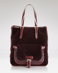 Unexpected details and contrasting textures update this classically styled tote from Longchamp. Unexpected details and contrasting textures update this classically styled tote from Longchamp.