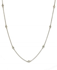 Inch by inch of luminous sparkle. B. Brilliant's delicate necklace features nine round-cut cubic zirconia stations (9/10 ct. t.w.) set in 18k gold over sterling silver. Approximate length: 20 inches. Inch by inch of luminous sparkle. B. Brilliant's delicate necklace features nine round-cut cubic zirconia stations (9/10 ct. t.w.) set in 18k gold over sterling silver. Approximate length: 20 inches.