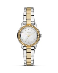 Two-tone watches are an up-to-the-minute choice. This subtly styled DKNY bracelet makes a classic yet modern statement, crafted of plated stainless steel and finished in glitz. Two-tone watches are an up-to-the-minute choice. This subtly styled DKNY bracelet makes a classic yet modern statement, crafted of plated stainless steel and finished in glitz.