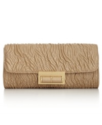 Petite and posh, this Ivanka Trump clutch is sized-right for chic soirees and other evening escapades. Faux luxe leather, discrete chain-link strap and sleek shape make it the ideal out-all-night accessory. Petite and posh, this Ivanka Trump clutch is sized-right for chic soirees and other evening escapades. Faux luxe leather, discrete chain-link strap and sleek shape make it the ideal out-all-night accessory.