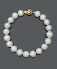 Sophistication and elegance come naturally with a simple strand of pearls. Bracelet features AA+ cultured freshwater pearls (9-10 mm) with an ornate 14k gold clasp. Approximate length: 7-1/2 inches.