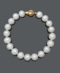 Sophistication and elegance come naturally with a simple strand of pearls. Bracelet features AA+ cultured freshwater pearls (9-10 mm) with an ornate 14k gold clasp. Approximate length: 7-1/2 inches. Sophistication and elegance come naturally with a simple strand of pearls. Bracelet features AA+ cultured freshwater pearls (9-10 mm) with an ornate 14k gold clasp. Approximate length: 7-1/2 inches.