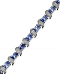 Enhance your look with an element of shine. This stunning sterling silver bracelet showcases oval-cut tanzanite (5-3/4 ct. t.w.) and shimmering diamond accents. Approximate length: 7-1/2 inches. Enhance your look with an element of shine. This stunning sterling silver bracelet showcases oval-cut tanzanite (5-3/4 ct. t.w.) and shimmering diamond accents. Approximate length: 7-1/2 inches.