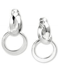 Never forget the reliability of hoops. This doorknocker design from Jones New York takes a turn with twisted detail. Crafted in silver tone mixed metal. Clip-on backing for non-pierced ears. Approximate drop: 1 inch. Never forget the reliability of hoops. This doorknocker design from Jones New York takes a turn with twisted detail. Crafted in silver tone mixed metal. Clip-on backing for non-pierced ears. Approximate drop: 1 inch.