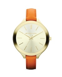 Known for classic, clean accessories, the Michael Kors watch is on this season's it-list. This understated piece works the look with a pearly round dial, set on a pristine leather strap. Known for classic, clean accessories, the Michael Kors watch is on this season's it-list. This understated piece works the look with a pearly round dial, set on a pristine leather strap.