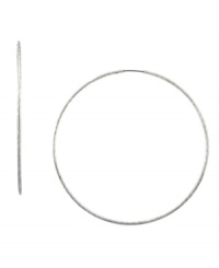 Big time style. Jessica Simpson's not-so-subtle hoop earrings make a bold statement. Crafted in thin silver tone mixed metal. Approximate diameter: 3 inches. Big time style. Jessica Simpson's not-so-subtle hoop earrings make a bold statement. Crafted in thin silver tone mixed metal. Approximate diameter: 3 inches.