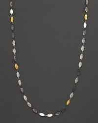 Gurhan's Willow necklace blends white silver, dark silver and 24 Kt. yellow gold in hammered leaf shapes to create a flowing, textured complement to your most elegant attire. Gurhan's Willow necklace blends white silver, dark silver and 24 Kt. yellow gold in hammered leaf shapes to create a flowing, textured complement to your most elegant attire.