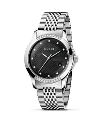 Modern and metropolitan, the Gucci G-Timeless Collection offers a highly contemporary design.Discerning customers will appreciate the iconic details that are the signature of all Gucci timepieces and indeed the House of Gucci. From the Gucci ‘G' shadow monogram on the watch face, to the Gucci diamond motif discreetly displayed on the dial, or the green-red-green web on the sports models, these finishing flourishes serve to underline the rich history behind this collection. Modern and metropolitan, the Gucci G-Timeless Collection offers a highly contemporary design.Discerning customers will appreciate the iconic details that are the signature of all Gucci timepieces and indeed the House of Gucci. From the Gucci ‘G' shadow monogram on the watch face, to the Gucci diamond motif discreetly displayed on the dial, or the green-red-green web on the sports models, these finishing flourishes serve to underline the rich history behind this collection.