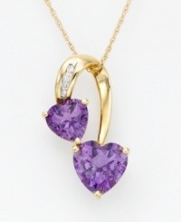 Satisfy your craving for vibrant color with this sparkling pendant! Two graduated heart-shaped amethysts 2-5/8 ct. t.w.) are prong-set in 14k gold. Diamond accents add elegance.