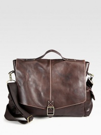Crafted from luxurious full grain enzyme washed vachetta leather satchel-style messenger bag with contrast digital print, this is a suitable accessory for your everyday needs.Flap, buckle closureTop handleRemovable, adjustable shoulder strapExterior pouch pocketsInterior slip pocketCotton twill/leather liningLeather13W x 16H x 5DImported Crafted from luxurious full grain enzyme washed vachetta leather satchel-style messenger bag with contrast digital print, this is a suitable accessory for your everyday needs.Flap, buckle closureTop handleRemovable, adjustable shoulder strapExterior pouch pocketsInterior slip pocketCotton twill/leather liningLeather13W x 16H x 5DImported