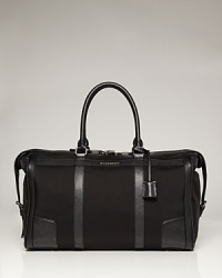 Whether you're headed out of town for the weekend or jetting across the sea for a longer duration, this quality duffel makes a fine travel companion with ample storage for all your essentials. Whether you're headed out of town for the weekend or jetting across the sea for a longer duration, this quality duffel makes a fine travel companion with ample storage for all your essentials.