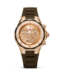 Mix it sporty-luxe with this watch from Michele. Rose gold dazzles from the face and a shapely bezel brings the counterpoint. Day-right, evening ready. Mix it sporty-luxe with this watch from Michele. Rose gold dazzles from the face and a shapely bezel brings the counterpoint. Day-right, evening ready.