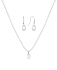 Casual chic. This pendant and earrings set from Majorica pops with organic man-made pearls (9 mm). The ivory-colored cord necklace adds a touch of whimsy. Crafted in silver tone mixed metal. Approximate length: 16 to 18 inches. Approximate drop: 1/2 inch. Casual chic. This pendant and earrings set from Majorica pops with organic man-made pearls (9 mm). The ivory-colored cord necklace adds a touch of whimsy. Crafted in silver tone mixed metal. Approximate length: 16 to 18 inches. Approximate drop: 1/2 inch.