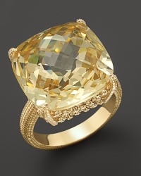 An elegant 18K gold ring with cushion cut canary crystal stone. By Judith Ripka. An elegant 18K gold ring with cushion cut canary crystal stone. By Judith Ripka.