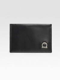 A slim-line design that fits smoothly into an inner blazer pocket in superior calfskin leather with signature gancio detail. Three credit card slots 4½ X 3H Made in Italy A slim-line design that fits smoothly into an inner blazer pocket in superior calfskin leather with signature gancio detail. Three credit card slots 4½ X 3H Made in Italy