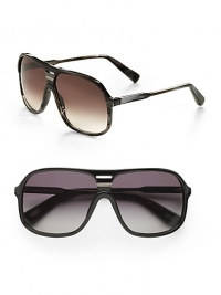 Sleek and sporty in lightweight acetate with engraved logo temple detail. Available in dark horn frames with grey gradient lenses or black frames with grey shade lenses. Logo temple detail 100% UV protective Made in Italy Sleek and sporty in lightweight acetate with engraved logo temple detail. Available in dark horn frames with grey gradient lenses or black frames with grey shade lenses. Logo temple detail 100% UV protective Made in Italy