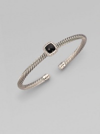 From the Noblesse Collection. Shimmering pavé diamonds frame a faceted black onyx stone, delicately perched atop a cabled silver cuff. Diamonds, 0.14 tcw Black onyx Sterling silver Cable, 5mm Diameter, about 2¼ Made in USA From the Noblesse Collection. Shimmering pavé diamonds frame a faceted black onyx stone, delicately perched atop a cabled silver cuff. Diamonds, 0.14 tcw Black onyx Sterling silver Cable, 5mm Diameter, about 2¼ Made in USA