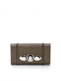 THE LOOKElegant rectangular evening clutchJeweled contour flap with magnetic closureTuck-away shoulder chain, 15 dropTHE FIT9W X 5W X 1DTHE MATERIALKarung snakeskinSuede-like and metallic leather liningORIGINMade in USA THE LOOKElegant rectangular evening clutchJeweled contour flap with magnetic closureTuck-away shoulder chain, 15 dropTHE FIT9W X 5W X 1DTHE MATERIALKarung snakeskinSuede-like and metallic leather liningORIGINMade in USA