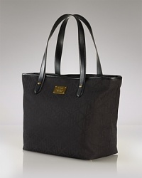 Luxurious touches make all the difference, so make day moves with this tote from Lauren Ralph Lauren. Crafted from sturdy cotton and trimmed in leather, this piece will be an elegant addition to your practical portfolio. Luxurious touches make all the difference, so make day moves with this tote from Lauren Ralph Lauren. Crafted from sturdy cotton and trimmed in leather, this piece will be an elegant addition to your practical portfolio.