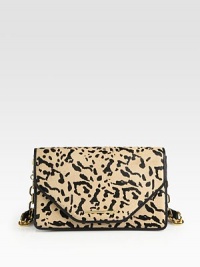 Animal printed haircalf trimmed in luxurious leather with a radiant chain strap.Chain and leather shoulder strap, 10 dropMagnetic flap closureProtective metal feetThree inner compartmentsOne inside zip pocketTwo inside open pocketsFully lined5½W X 9½H X 2DImported Animal printed haircalf trimmed in luxurious leather with a radiant chain strap.Chain and leather shoulder strap, 10 dropMagnetic flap closureProtective metal feetThree inner compartmentsOne inside zip pocketTwo inside open pocketsFully lined5½W X 9½H X 2DImported