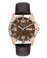 Exude confidence with the contemporary vibe of this watch by Caravelle by Bulova. Brown croc-embossed leather strap and round rose-gold tone stainless steel case. Brown dial with square textured inner dial features applied rose-gold tone numerals at twelve, six and nine o'clock, stick indices, minute track, date window at three o'clock, luminous hands and logo. Quartz movement. Water resistant to 30 meters. Two-year limited warranty. Exude confidence with the contemporary vibe of this watch by Caravelle by Bulova. Brown croc-embossed leather strap and round rose-gold tone stainless steel case. Brown dial with square textured inner dial features applied rose-gold tone numerals at twelve, six and nine o'clock, stick indices, minute track, date window at three o'clock, luminous hands and logo. Quartz movement. Water resistant to 30 meters. Two-year limited warranty.