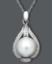 The perfect finishing touch. This elegant pendant features a chic, teardrop shape highlighting a cultured freshwater pearl (9-10 mm) and sparkling diamond accents. Set in sterling silver. Approximate length: 18 inches. Approximate drop: 1 inch. The perfect finishing touch. This elegant pendant features a chic, teardrop shape highlighting a cultured freshwater pearl (9-10 mm) and sparkling diamond accents. Set in sterling silver. Approximate length: 18 inches. Approximate drop: 1 inch.