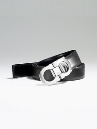 Smooth Italian calfskin reverses from black to brown. Nickel gancini buckle 1 wide Made in Italy Smooth Italian calfskin reverses from black to brown. Nickel gancini buckle 1 wide Made in Italy