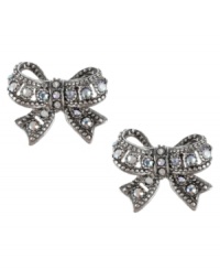 Tie together your new look. These chic Betsey Johnson earrings feature flirty bows with crystal accents, set in silver tone mixed metal. Approximate drop: 5/8 inch. Tie together your new look. These chic Betsey Johnson earrings feature flirty bows with crystal accents, set in silver tone mixed metal. Approximate drop: 5/8 inch.