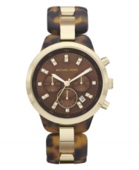 Get a preppy vibe in a matter of seconds with this chic watch from Michael Kors. Get a preppy vibe in a matter of seconds with this chic watch from Michael Kors.