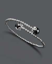 Give your look a bold edge. Wrapped cuff bracelet features a sterling silver sparkle bead setting with polished onyx ball ends (7-2/8 mm). Approximate length: 7-1/2 inches. Give your look a bold edge. Wrapped cuff bracelet features a sterling silver sparkle bead setting with polished onyx ball ends (7-2/8 mm). Approximate length: 7-1/2 inches.
