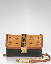 A vintage-inspired piece gets a modern update with leopard-print detailing and on-trend shape. Carry this MCM crossbody to work the perfect combination of classic and cool. A vintage-inspired piece gets a modern update with leopard-print detailing and on-trend shape. Carry this MCM crossbody to work the perfect combination of classic and cool.