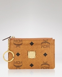 Key takeaway: statement accessories like this card case from MCM. Crafted of coated canvas and splashed with the brand's motif, it's a luxe way to work statement style. Key takeaway: statement accessories like this card case from MCM. Crafted of coated canvas and splashed with the brand's motif, it's a luxe way to work statement style.