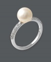 Timeless style in sweet, polished pearl. This elegant design by Effy Collection highlights a cultured freshwater pearl (9-1/2 mm) in a simple band decorated with sparkling round-cut diamond (1/5 ct. t.w.). Set in 14k white gold.