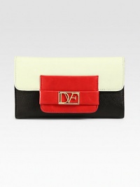 A high-contrast, colorblock design in supple leather with a logo emblem.Snap button flap closureOne inside zip pocketFifteen credit card slotsFive bill compartmentsLeather lining7½W X 4½H X ¾DImported A high-contrast, colorblock design in supple leather with a logo emblem.Snap button flap closureOne inside zip pocketFifteen credit card slotsFive bill compartmentsLeather lining7½W X 4½H X ¾DImported